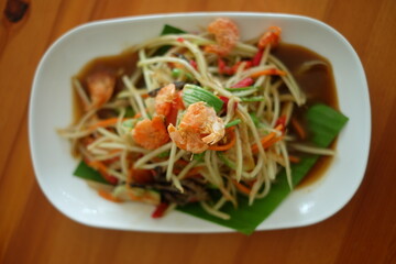 Papaya salad, the famous food of Thailand.Top view food.Fruit salad.