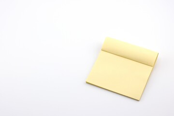 yellow sticky note with white background