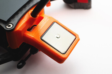 Nameless gps module installed on fpv quadrocopter assembled on a carbon frame. Drone orientation...