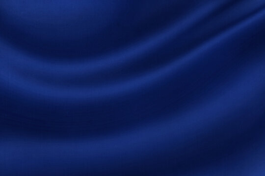 dark blue abstract background, satin silky. old navy blue color. background space design. soft wave fold