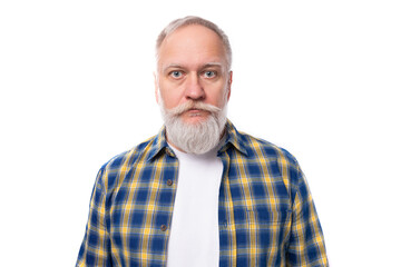 Fototapeta premium handsome senior gray-haired retired man with mustache and beard