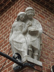 german weimar era sculpture of young man and woman on the house in konigsberg