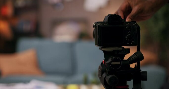 Self help author with camera focused on African American man shares valuable insights on personal development empowerment takes notes capturingprofound thoughts ideas which serve as the foundation.