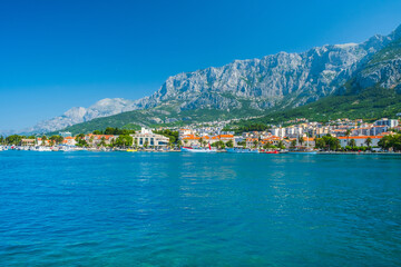 Fototapeta na wymiar Town of Makarska and Biokovo mountain in Dalmatia, Croatia