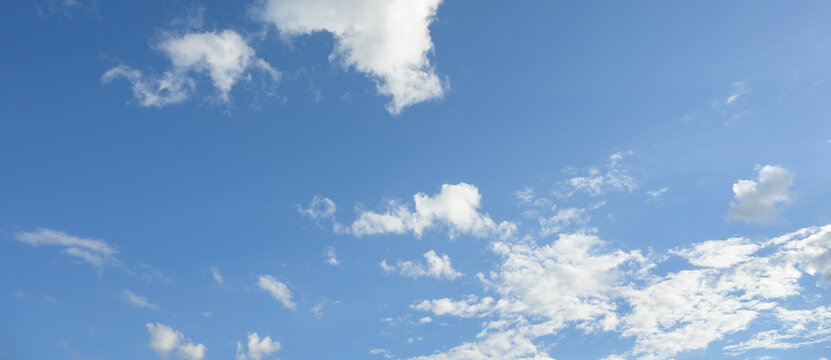 A blue sky background picture Bright sky with white clouds with blue sky background.
