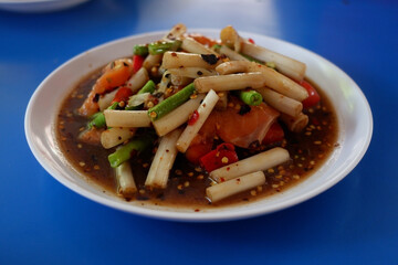 Papaya salad with lotus flow.