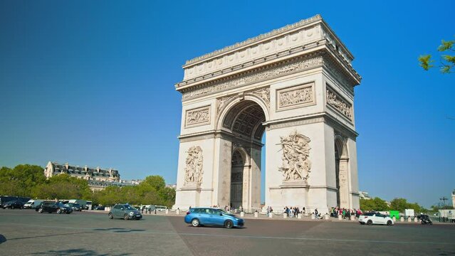 The historic landmark Arc de Triomphe in Paris, France. Iconic triumphal arch built to commemorate Napoleon's victories, with an observation deck.