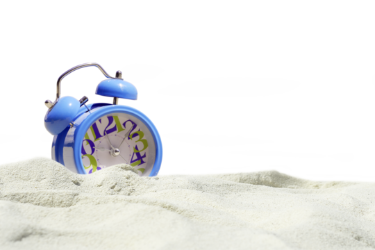 clock on sand transparent