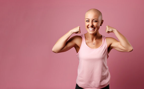 Studio Portrait Of A Happy Cancer Patient Against A Pink Background