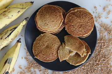 Khapli wheat plantain pancake. A healthy version of pancakes made of emmer wheat flour, ripe plantain, sweetened with jaggery