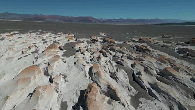 Drone footage of Campo de Piedra Pomez - a bizarre but beautiful landscape in the Argentinian highlands with a huge field of pumice, volcanic rocks and dunes of sand in the Puna - natural look