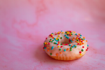 background.wallpaper.colorful donut on pink background.candy store.beautiful pastries.donut decor.big donut.display with sweets.homemade baking.cooking.holiday.hobby cooking.multicolored.
promotion