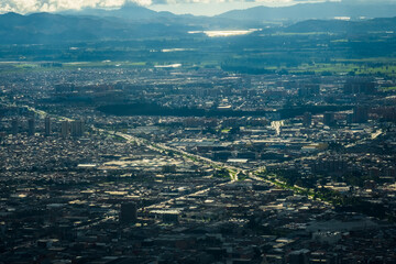 aerial view of Bogota capital cityscape of colombia overpopulated air pollution smog 