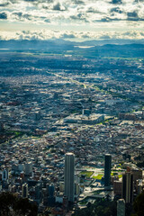 Fototapeta premium vertical of Bogota Colombia skyline cityscape with andes mountains on background 