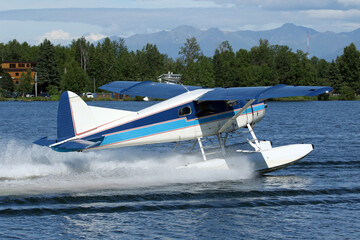 Beaver Floatplane taking off from Anchorage Lake Hood, Alaska