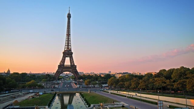 Pan footage of the Paris Tower from Trocadero in France. View of the symbolic landmark of Paris at golden sunset in ProRes 4K.