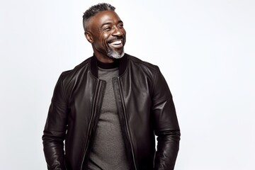 Handsome african american man in black leather jacket smiling at camera - Powered by Adobe