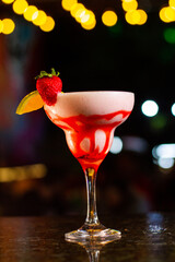 Delicious Strawberry Cocktail at a Night Scene