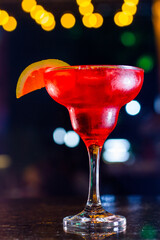 Sunset Tropical Delight: Indulge in the exotic flavors of Coconut Liqueur, Vodka, Tahitian Lime Juice, Kaly Grenadine and a fresh orange slice garnish.