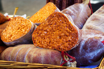 Sobrasada, cured raw sausage, made from selected pork meat, seasoned with salt, paprika and black pepper. It is stuffed into casings and has a slow maturation, traditional of the Balearic Islands.