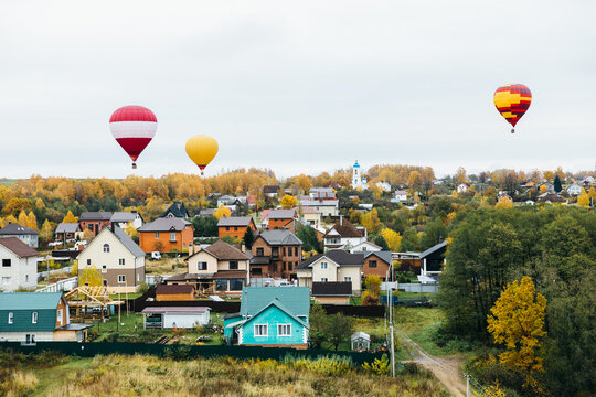 Aerostats over village