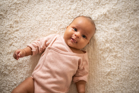 Cute black baby with tongue out