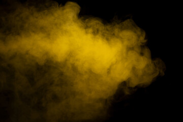 Yellow steam on a black background.