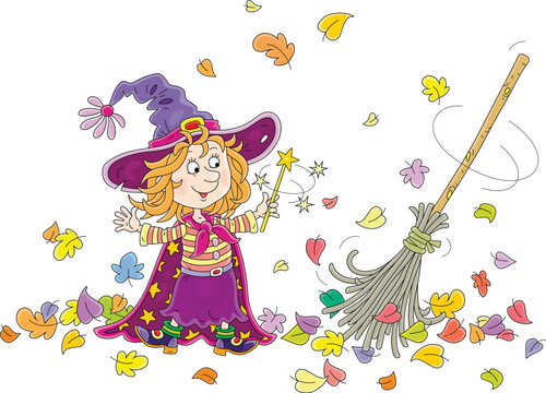 Happy little Halloween witch showing tricks with her magical broom sweeping fallen colorful leaves, vector cartoon illustration isolated on a white background