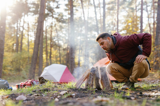 Prepare wood set on fire campfire forest 