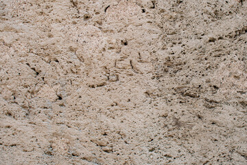 Limestone wall closeup. Rough texture, design, surface, finishing material, background