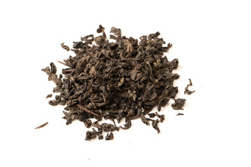 Dried tea leaves isolated on a white background.