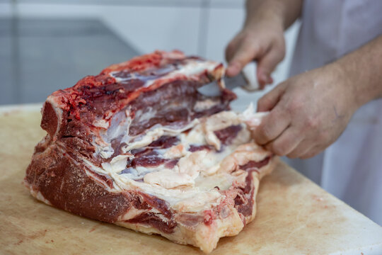 Chunk of meat with rich marbling at small family butchery
