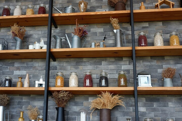 Shelves in a dessert shop display items.