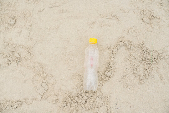 Plastic Bottle On The Sand
