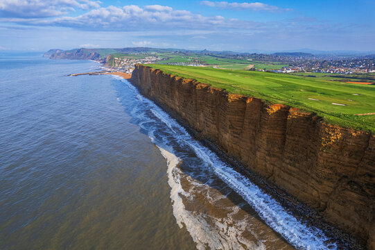 Aerial morning view of the West Bay cliffs on coastline of the Jurassic Coast, UNESCO World Heritage Site, Dorset, England