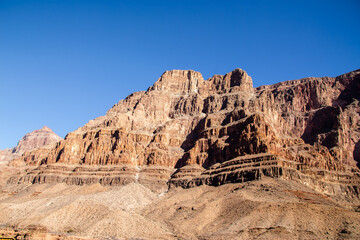 Fototapeta premium View of hill top on the Grand Canyon from boat on the Colorado river