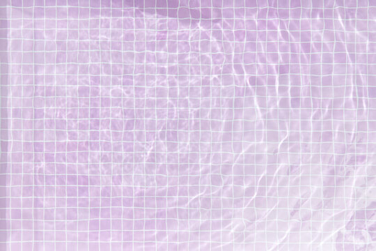Minimal swimming pool with pink tiles background.