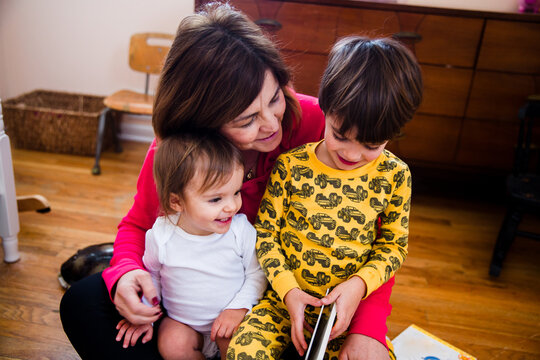 Grandma Reads A Book To Her Grandkids