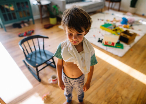 Frustrated boy tried to get dressed himself