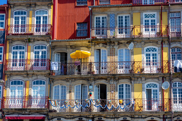 Beautiful colorful building facede in Porto Portugal with azulejo tiles