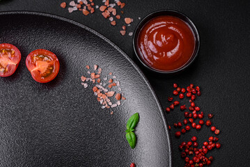 Ingredients for cooking cherry tomatoes, salt, spices and herbs