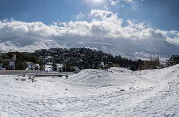 Beautiful view of the Bsharri District mountains covered in snow on a sunny day, Lebanon