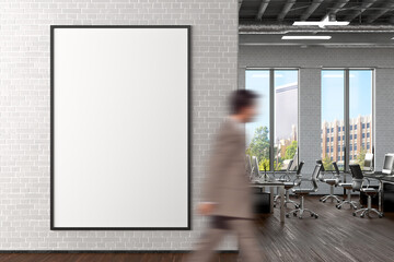 Blank vertical poster mock up on the white brick wall in office interior. 3d render.
