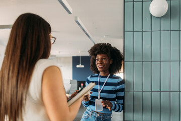 Two Female Colleagues in Office 