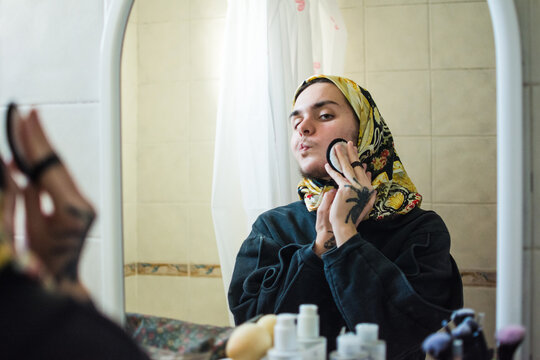 Non binary person beauty routine