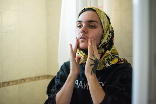 Trans muslim person facial self-care 