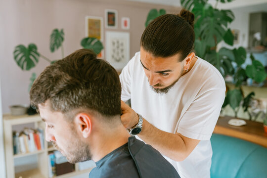 Hairstylist Giving a Professional Hair Trim at home