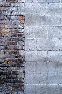 Stock image of old brick wall covered in metallic spray paint