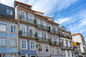 Obraz premium Beautiful colorful building facede in Porto Portugal with azulejo tiles