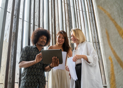 Coworkers At Office Corridor